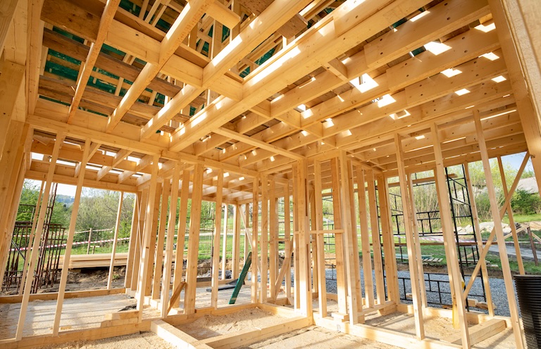New interior residential wooden construction house framing